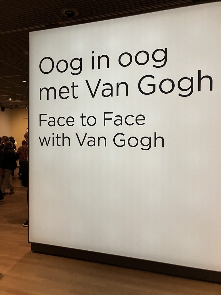 a sign inside of the van gogh museum