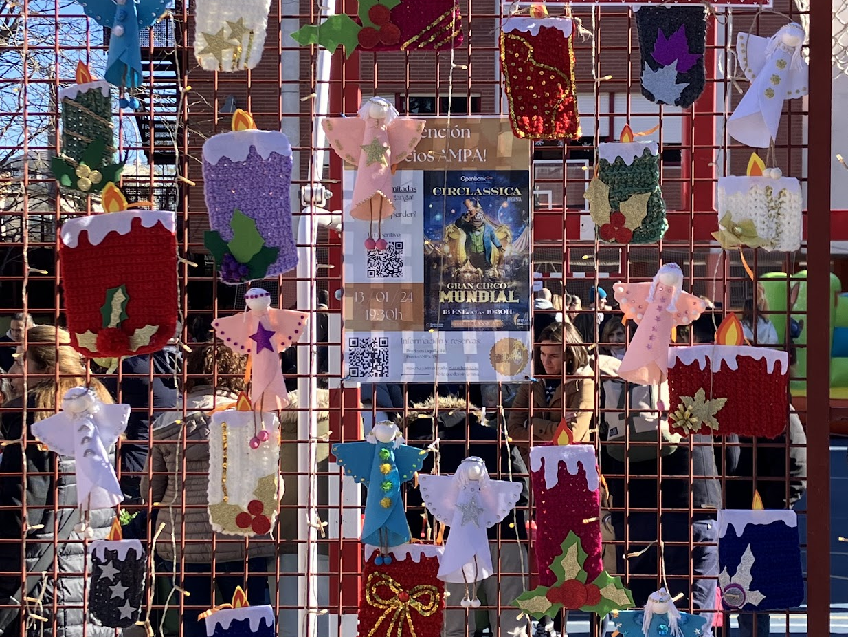 some christmas items for sell at a market hosted at a school in madrid spain