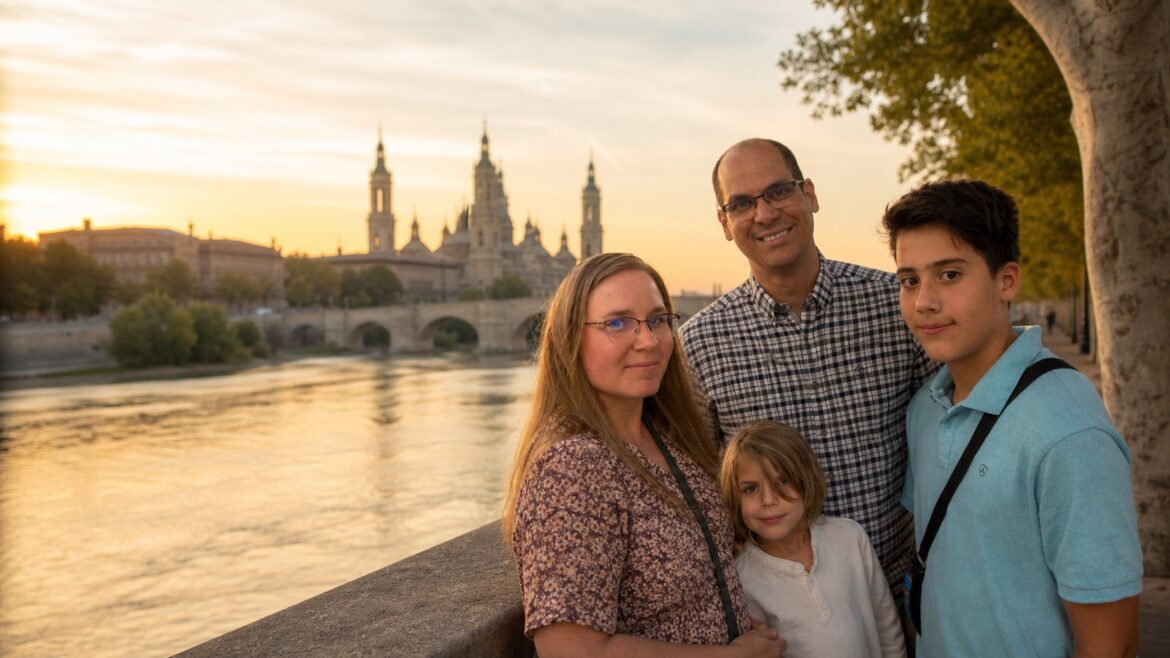 Burgos family beside the Ebro River with the Basilica del Pilar in Zaragoza, Spain